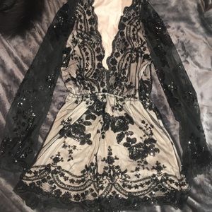 Black shiny sequin romper